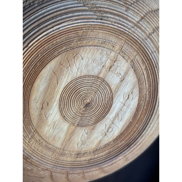 A stunning example of Pacific Northwest studio woodturning by artist D. Carlson, signed and dated March 12, 1994 on the...