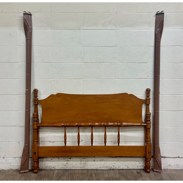 This is a gorgeous vintage Ethan Allen Baumritter Colonial Manor full-size bed, model 500, featuring a warm maple finish,...