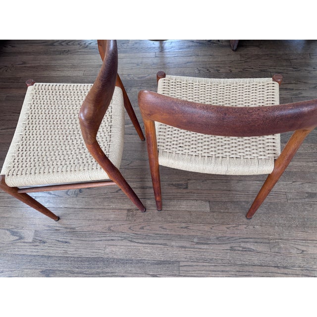 An iconic set of four Model 75 dining chairs designed by Niels Otto Møller for JL Møllers Møbelfabrik. A masterclass in...