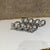 1990s Modern Aluminum Napkin Rings Cat Set of Eight (8) For Sale - Image 5 of 9