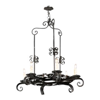 French 19th Century Black Iron Six-Light Chandelier with Scrolled Motifs For Sale