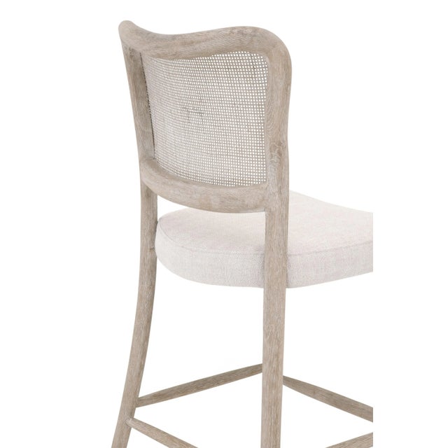The Cela Counter Stool by Essentials For Living melds timeless design with contemporary elements, making it an ideal...