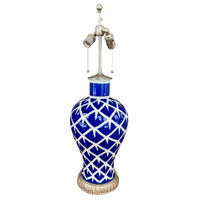 Pair of Bunny Williams Blue Chicken Feather Ceramic Hand Made Table Lamps. This vibrantly painted “chicken feather” design...