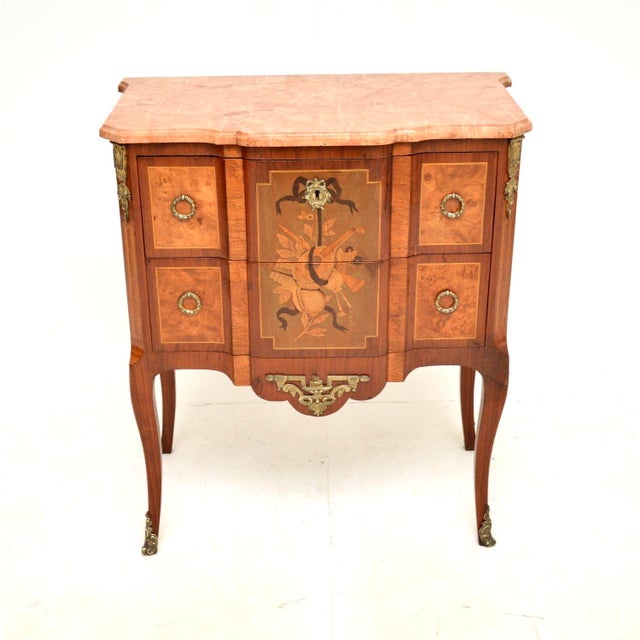 A stunning antique French commode with a marble top. This dates from around the 1880-1900 period. It is of superb quality,...