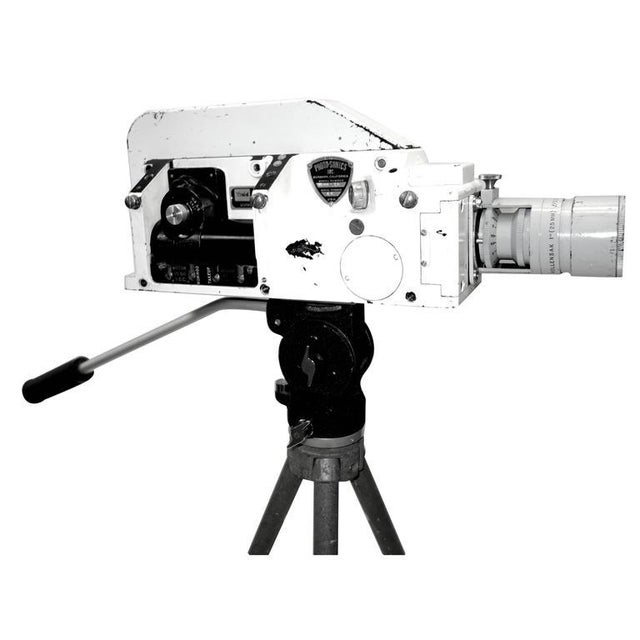 Offered for your consideration, this mid-20th century high speed 16mm motion picture camera. Used by the military for on...
