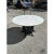10th century bistro table or dining table featuring a large round shape Carrara marble top. The Italian marble top is...
