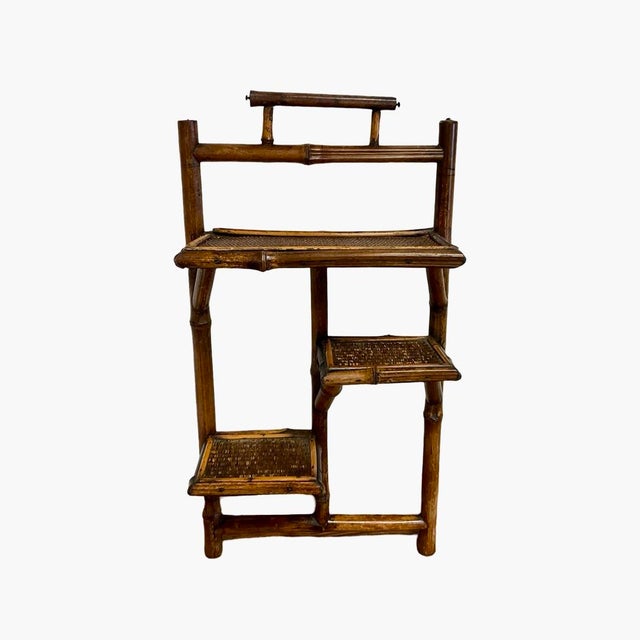 Mid 20th Century Bamboo Wall Shelf with Three Shelves. Handle Top, With Which to Hang the Piece. Woven Fiber Matting On...