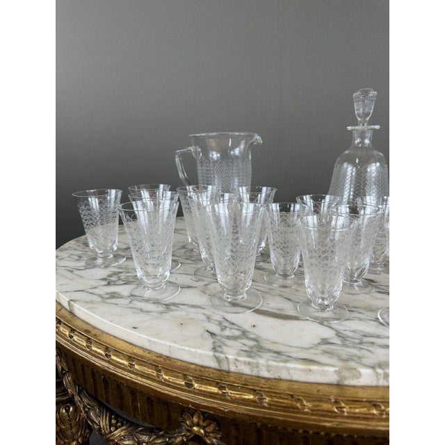 Magnificent Sèvres crystal glassware set, perfect for lovers of fine objects and collectors. This set includes 16 glasses,...