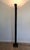 This designer floor lamp is made of black lacquered metal and is a halogen lamp. This is an Italian work. Circa 1970