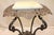 Elegant Victorian lamp side end table stand, c. 19th., featuring a square marble top above an ostentatious cast iron base....