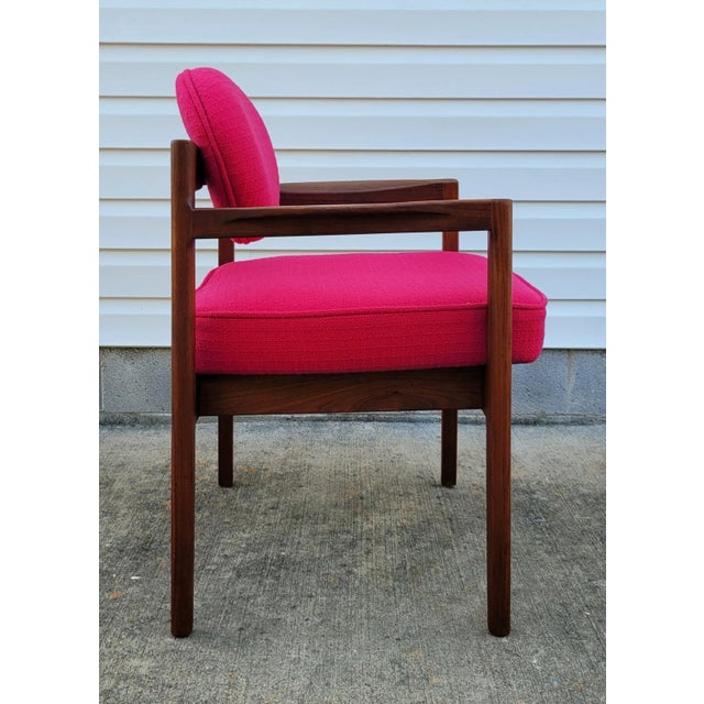 Oval back solid walnut armchair designed by Jens Risom, circa 1960's. This floating back chair can be used as an office...