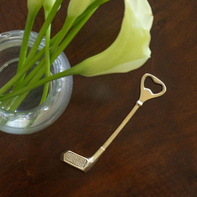 Unique vintage solid brass golf club bottle opener from France, 1950s. Beautiful etched brass with intricate details and...