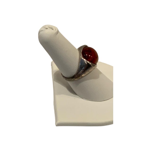 This is a lovely Sterling Silver Baltic Amber Cabochon Ring Size 7 1/2