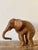 This charming vintage elephant figurine is a fine example of the intricate "Shanghai weave" technique, a hallmark of mid-...