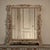Elegant Italian hand-carved walnut mirror, beautifully bleached to reveal the quiet warmth of the wood and the depth of...