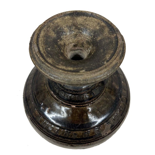 This is an antique Khmer stoneware baluster vase originating from Cambodia or Northeast Thailand during the Angkor period...