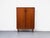 High-quality mid-century modern cabinet by RT Möbel from the 1960s. Made of reddish-brown teak with a simple,...