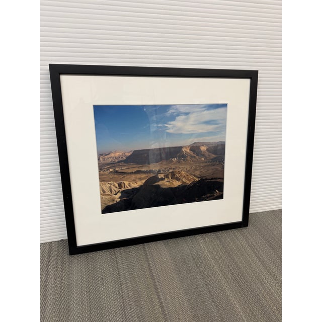 Design Plus Gallery presents a Custom Framed Zin Valley and Desert Cliffs in the Negev Desert Framed Photograph. This...