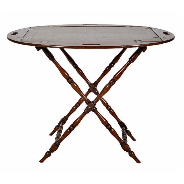 This is a classic example of a late 19th century/early 20th century fold-down Butler's Tray on a folding stand. The...