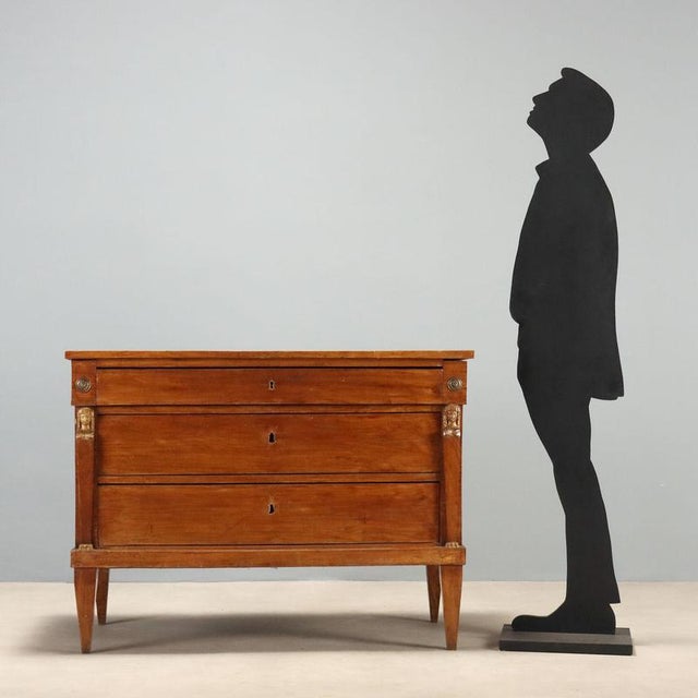 Empire walnut chest of drawers from Veneto, dating back to the early 19th century, exemplifies the elegance of the period...