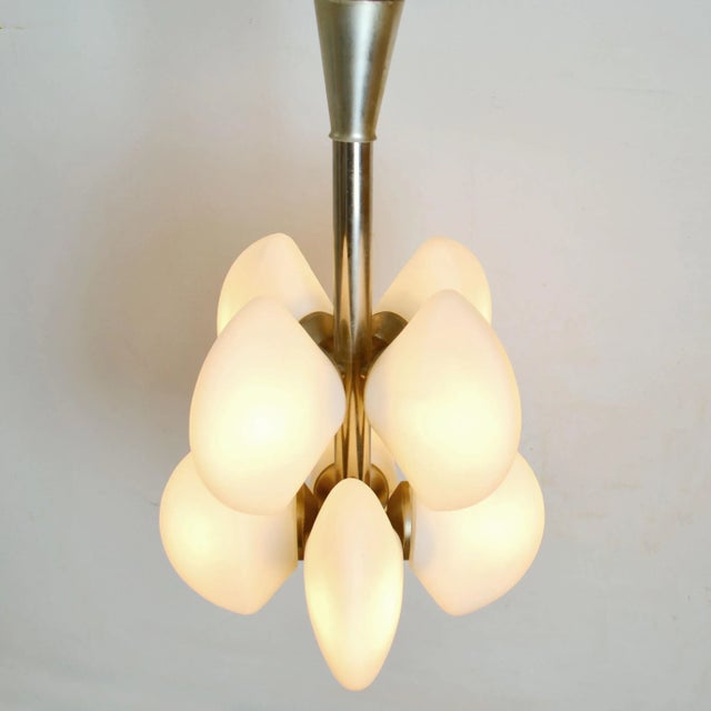 Flush mount 1960's sputnik pendant with eight shell shape opalescent shades on chrome frame. Up to 250V (Europe/UK...