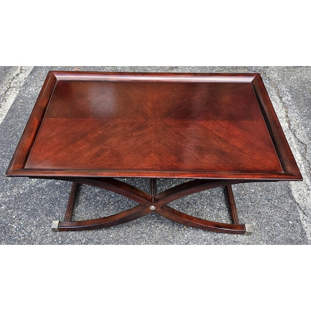 Contemporary Stained Fruitwood Coffee Table Referencing an antique English style with tray table top supported by graceful...