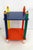 Small Crayons side table, bedside table or end table with two levels. Base shaped like four large colored pencils, with a...