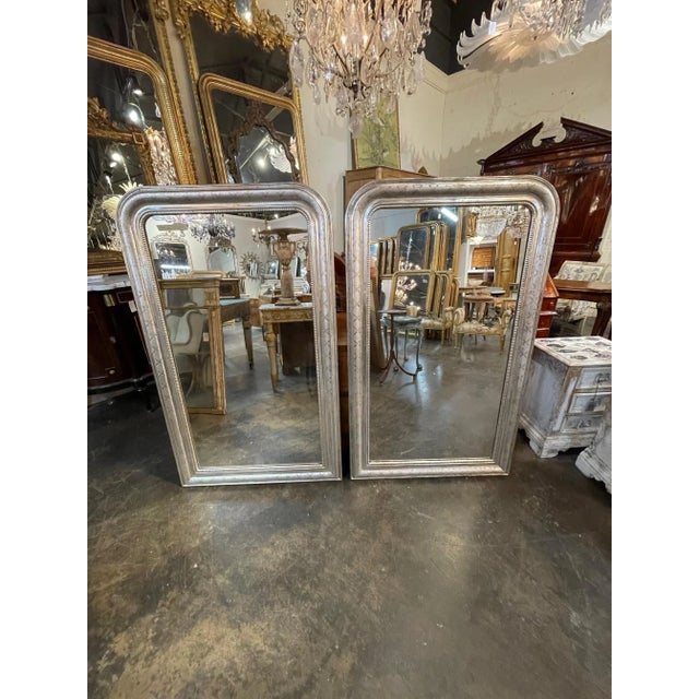 Exceptional pair of 19th Century silver leaf Louis Philippe mirrors with X pattern. I very good conditional and also has a...