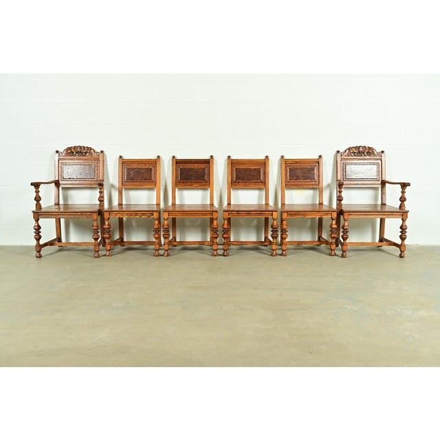 An exceptional set of six antique English Jacobean style dining chairs By Batesville Cabinet Co. (early Romweber) USA,...