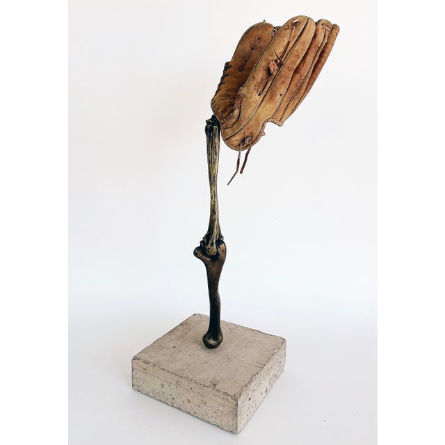 Bronze Arles del Rio Sculpture, "Hoping That Things Fall From the Sky" Offered for sale is a baseball glove sculpture by...