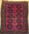 3’ 10” x 5’ 2” Vintage hand knotted Afghan area rug in a plum/deep burgundy color from the mid 1900s. The beautiful Afghan...
