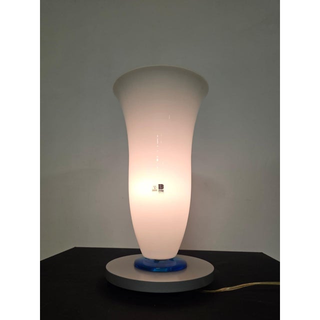 Table lamp by itre murano refined table lamp. satin lacquered metal base and blue glass. vase-shaped white murano glass...