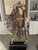 This is a beautiful sculpture we had in a large dining room. We have downsized and it needs a new home.