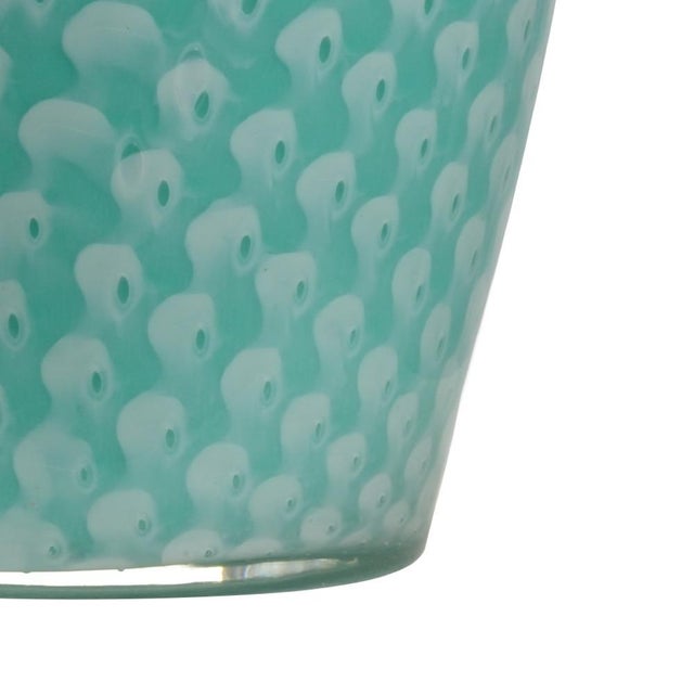 Inspired by the crystal blue-green waters of the caribbean, antigua lamp features mouth blown italian glass with a...