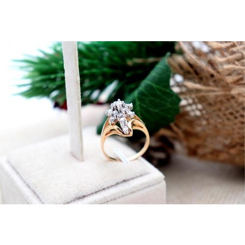 Two-tone gold ring with brilliant-cut diamonds (15) inlaid. Metal: Gold. Origin: European. Brand: Unknown. Weight: 4.64...