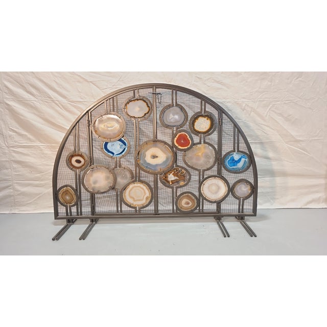 This is a magnificent, striking, and unique fireplace screen with agate accents in the style of Phillip Nimmo. With...
