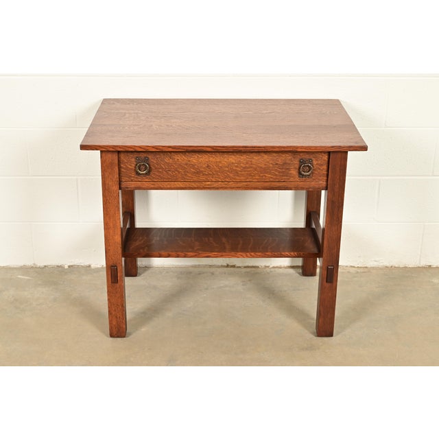 An exceptional antique Mission or Arts & Crafts period writing desk or library table By Lifetime Furniture USA, Circa 1910...