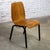 Awesome vintage Modern chairs composed of walnut molded plywood frames, black painted bases and hardware, stackable and...
