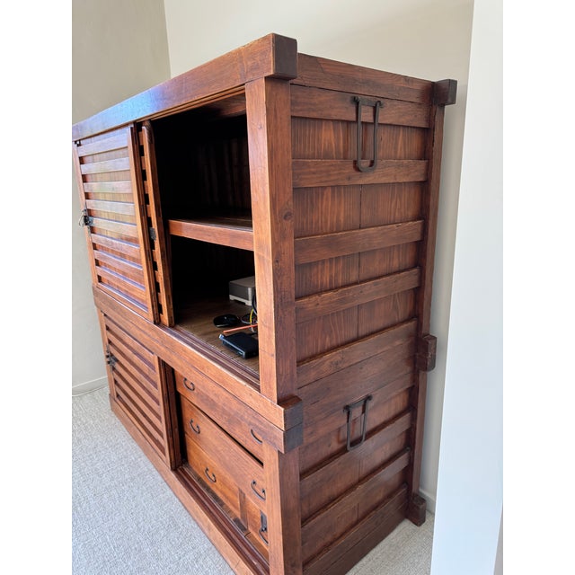 Beautiful antique Japanese tansu cabinet, handcrafted with incredible detail and character. This is a substantial,...