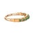 A stunning 14k gold bracelet featuring cabochon-cut emeralds. The vibrant green stones are complemented by round-cut white...