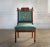 Antique Aesthetic Movement chair with needlepoint upholstered seat and backrest and hand carved detail. Front legs have...