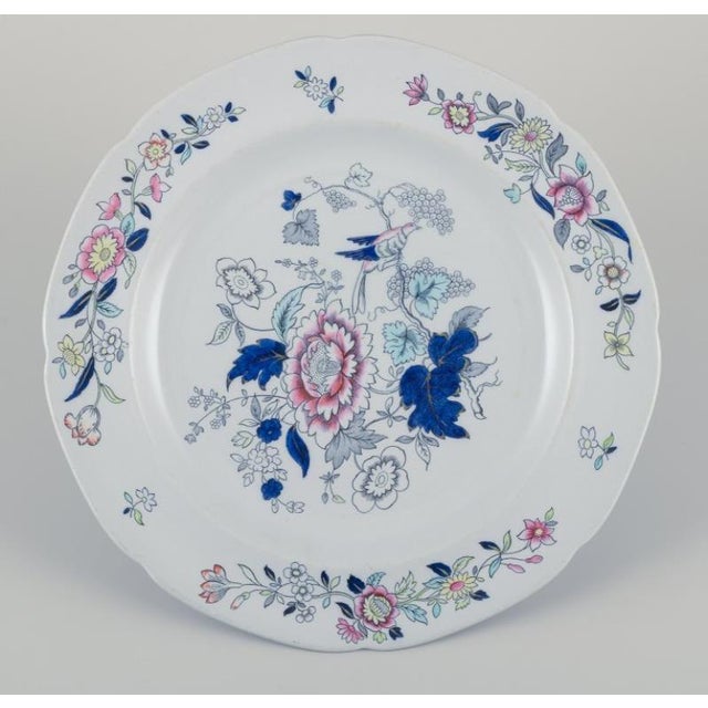 Copeland/Spode, England. Six dinner plates in faience. Decorated with flower and bird motifs. Approximately from the...