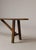 Beautiful antique primitive bench featuring a single plank top, splayed trestle legs with X-stretcher bracing and mortise...