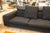 A monumental Minotti 3pc sectional sofa with matching ottomans. This is an absolutely stunning sectional with incredible...