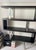 4 level modern design book shelf by Modloft Black lacquered hard wood with chrome accents Paid $1200 in 2019 162 lbs...