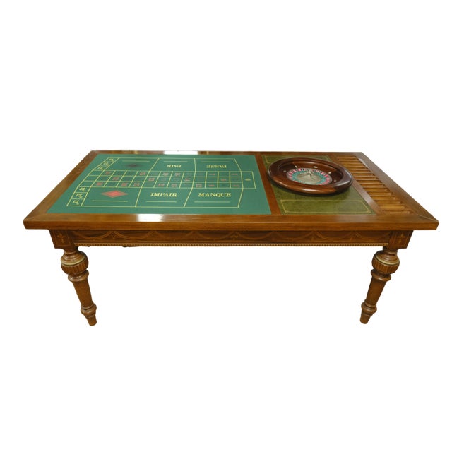 French Game Table An elegant and imposing game table crafted entirely from walnut, embellished with inlays of fine...