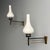 Italian Mid-Century Modern, Wall Sconces or Wall Lights, Patinated Brass, Opaline Glass, Italy, 1950s This stunning pair...
