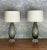 This handsome pair of Italian Murano glass table lamps from the 1950s is distinguished by a beautifully textured diamond...