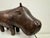 A mid-century leather hippopotamus ottoman produced by Omersa for Liberty, crafted in thick, hand-dyed hide with a richly...