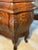 Oh, darling seeker of timeless elegance, allow this captivating Louis XV-style bombe commode to sweep you into the lavish...